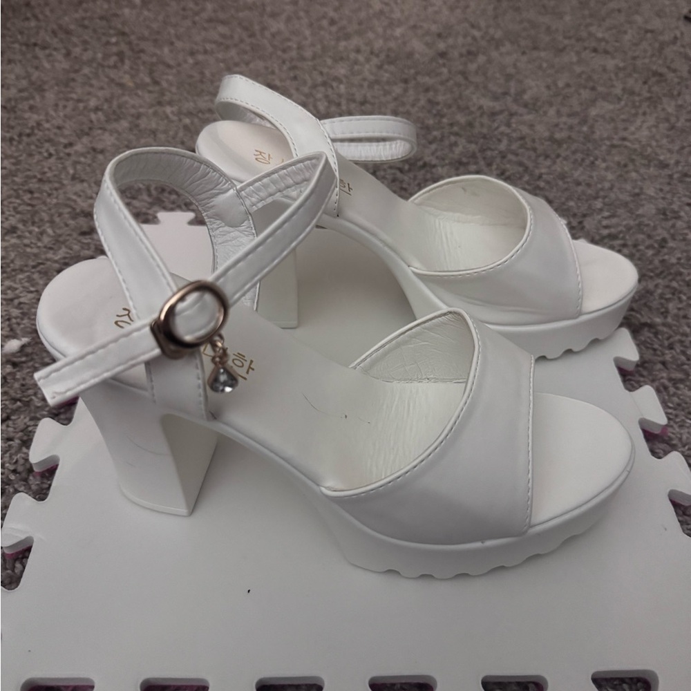 White Leather Heels with Ankle Strap and Decorative Element